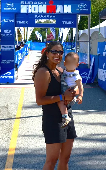 Natasha completing her Ironman with her one-year-old child